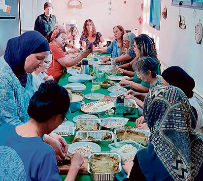 Rolling together: women from both communities yk14474918