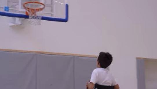 Noam plays wheelchair basketball