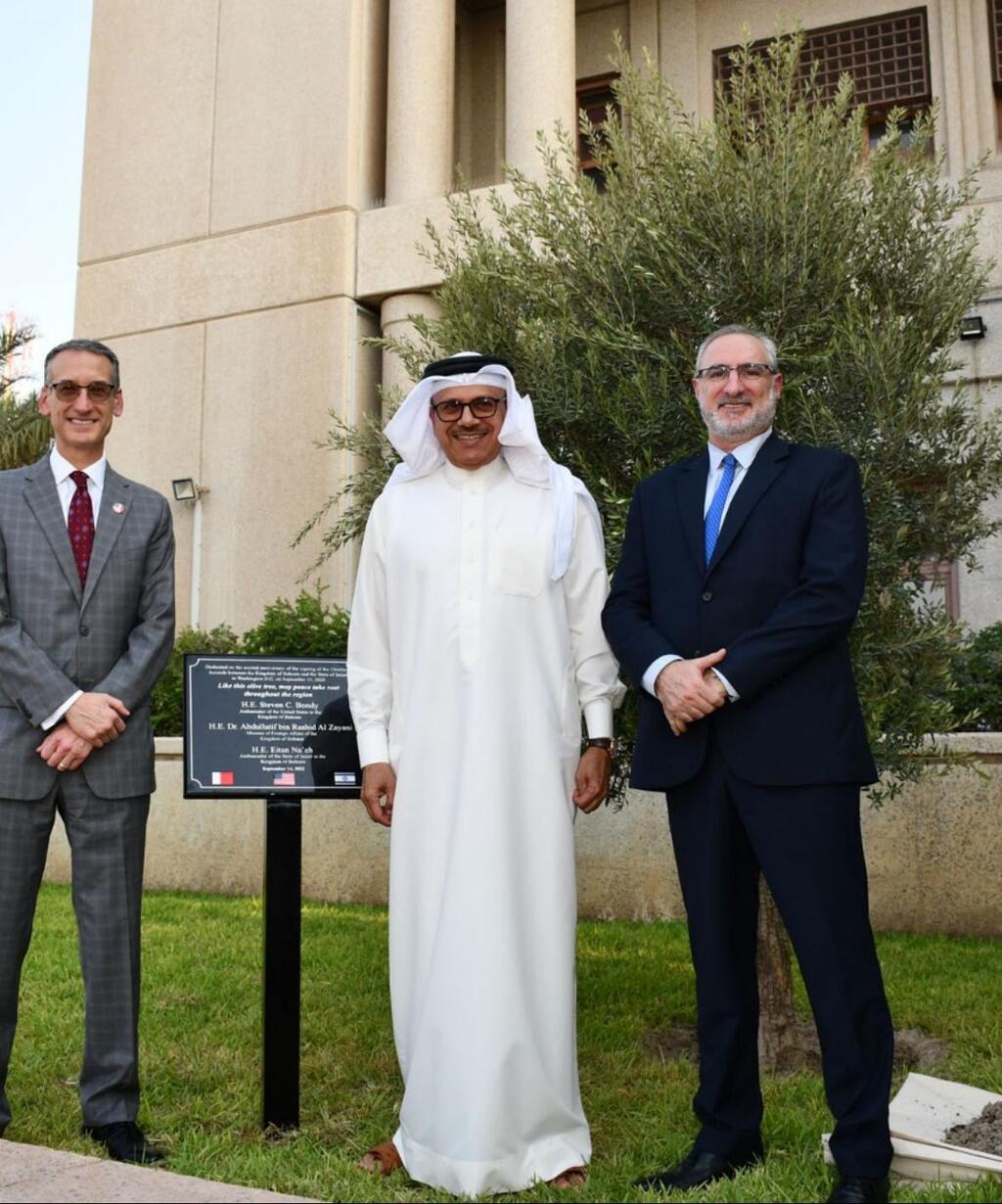 Olive tree planting ceremony in the courtyard of the U.S. Embassy to mark the second anniversary of the Abraham Accords. In the center is the Bahraini foreign minister.