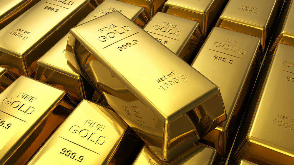 Золотые слитки (Фото: shutterstock) מטילי זהב