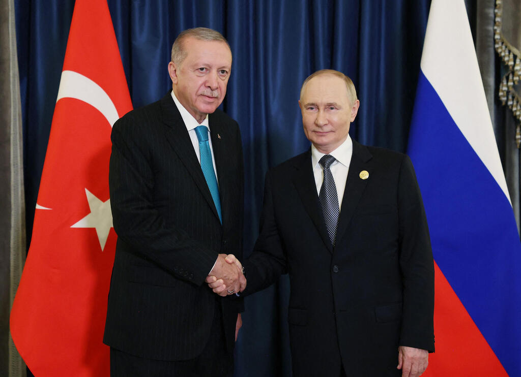 רג'פ טאיפ ארדואן עם ולדימיר פוטין בפסגה ב סין