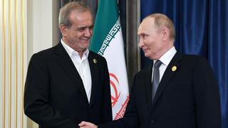 ולדימיר פוטין עם נשיא איראן מסעוד פזשכיאן ב סין 