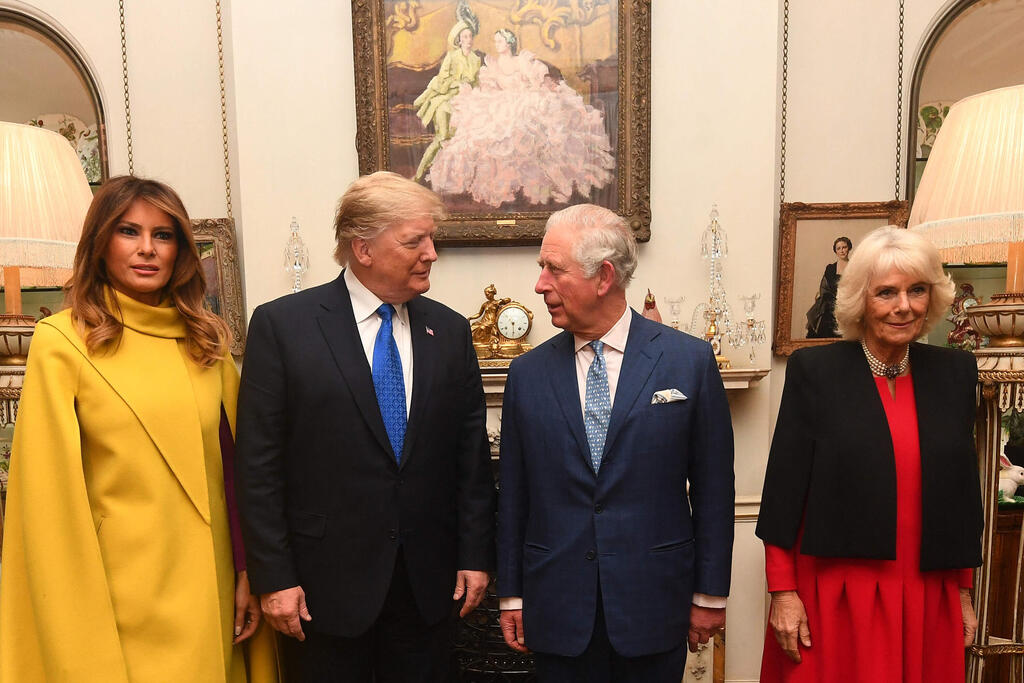 US President Donald Trump and First Lady Melania Trump meet with then-Prince Charles and his wife Camilla at Clarence House in central London during a state visit in 2019