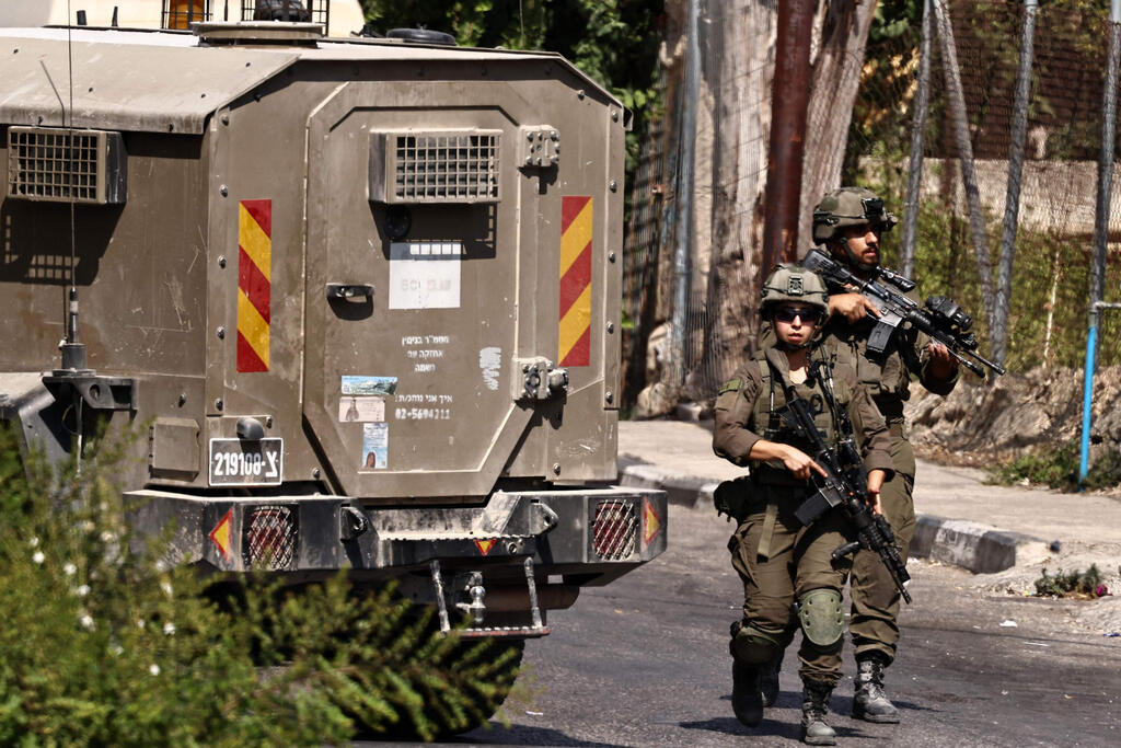 IDF forces in Ramallah (Photo: Zain JAAFAR / AFP) כוחות צה"ל ברמאללה