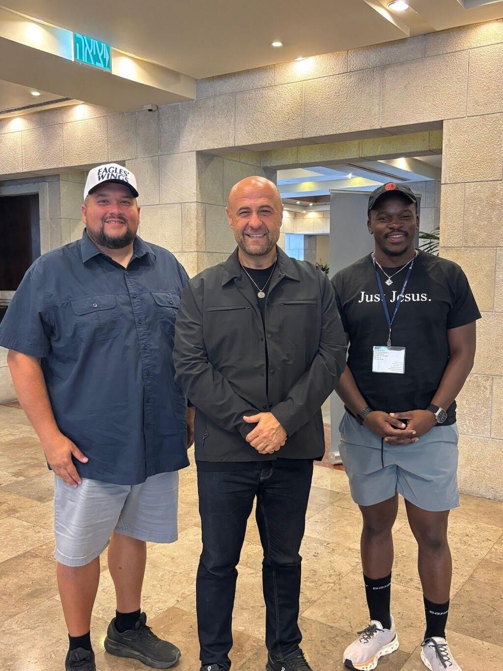 Doug Reed, Bishop Robert Stearns, and Micheal Omoniyi (Maayan Hoffman) Doug Reed, Bishop Robert Stearns, and Micheal Omoniyi
