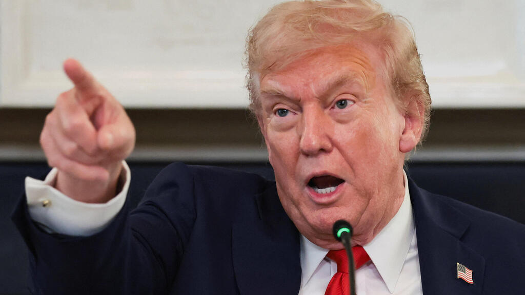 Дональд Трамп (Фото: REUTERS/Evelyn Hockstein) הנשיא דונלד טראמפ