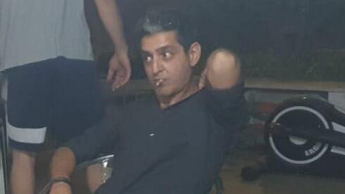 רועי עידן ז"ל (מימין) עם חבריו לשולחן הפוקר