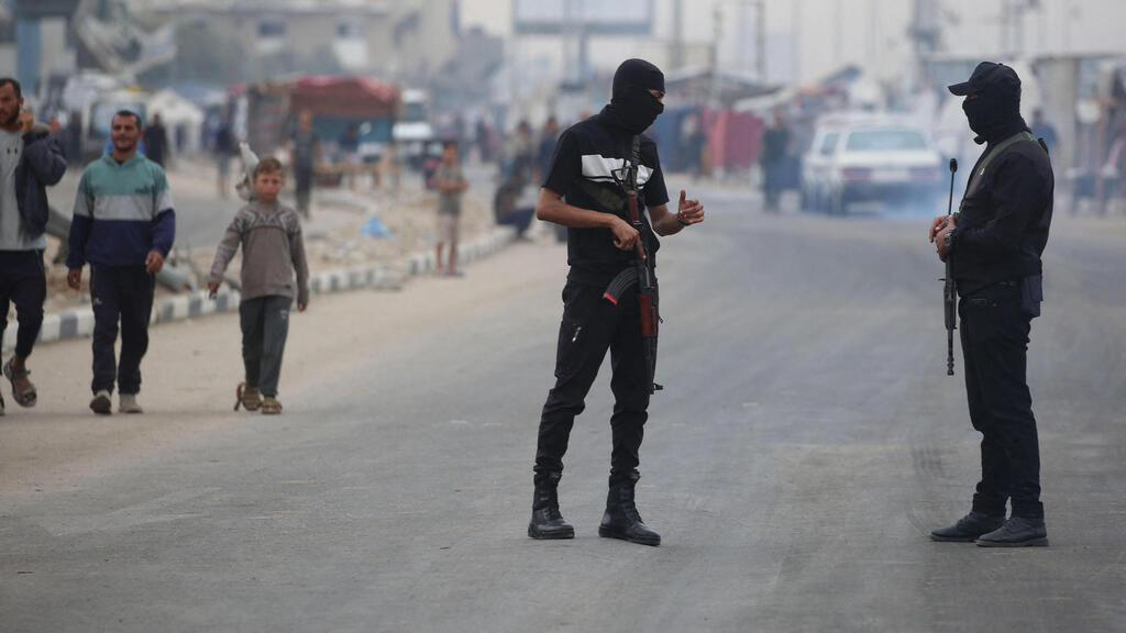 No unusual activity detected. Hamas terrorists in Gaza (Photo: Eyad BABA / AFP) מחבלי חמאס בנוסייראת