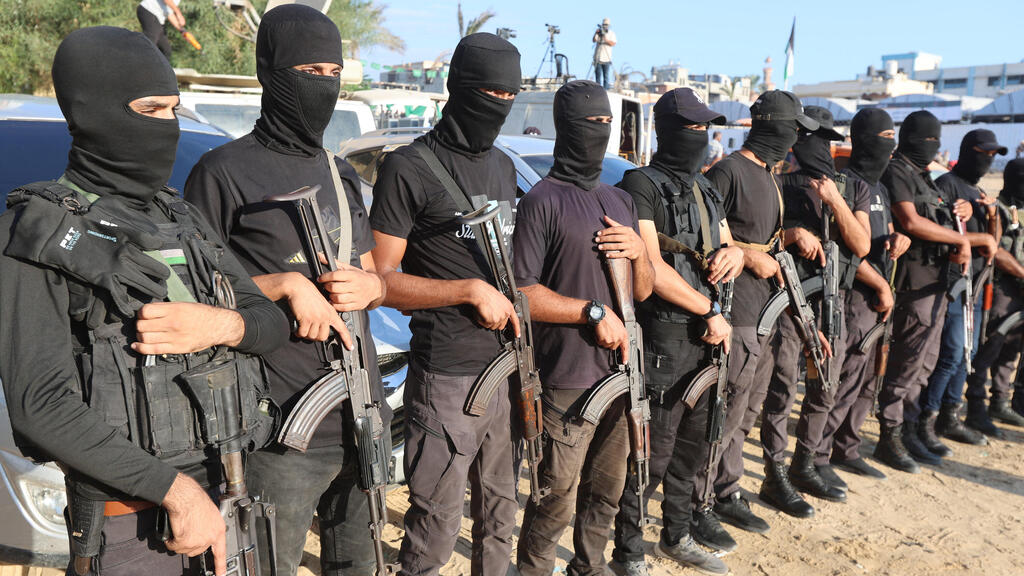 About 20,000 Hamas terrorists are still operating in the Gaza Strip (Photo: REUTERS/Ramadan Abed) מחבלי חמאס בעזה