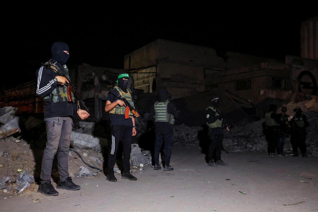 Photo: REUTERS/Dawoud Abu Alkas מחבלי חמאס