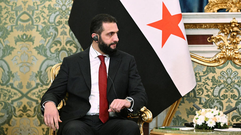 'Interim president' (Photo: Sputnik/Sergey Bobylyov/Pool via REUTERS) נשיא רוסיה ולדימיר פוטין נשיא סוריה אחמד א-שרע