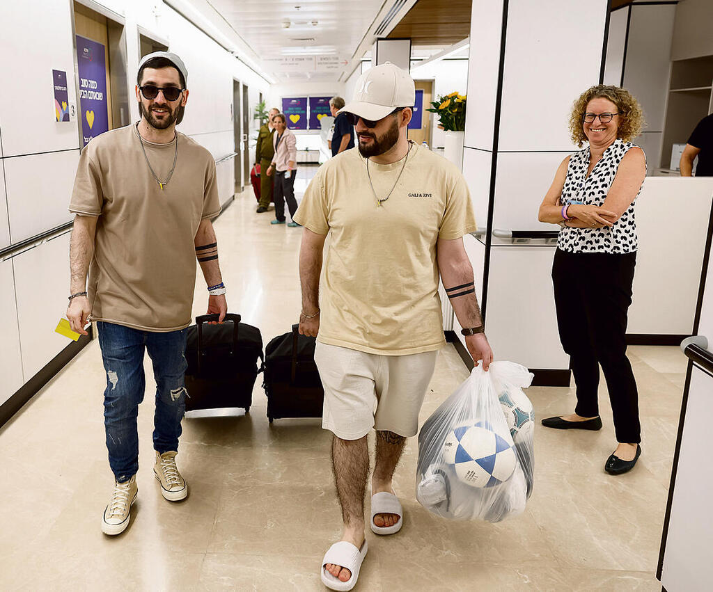 Leaving the hospital ward, soccer ball in hand (Photo: Ziv Koren) yk14552792