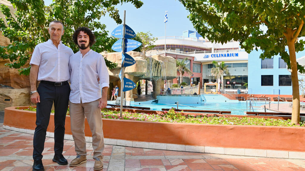 Club Hotel CEO Nur Amer and Bublil's son Ben at a memorial dedicated to the late owner 
