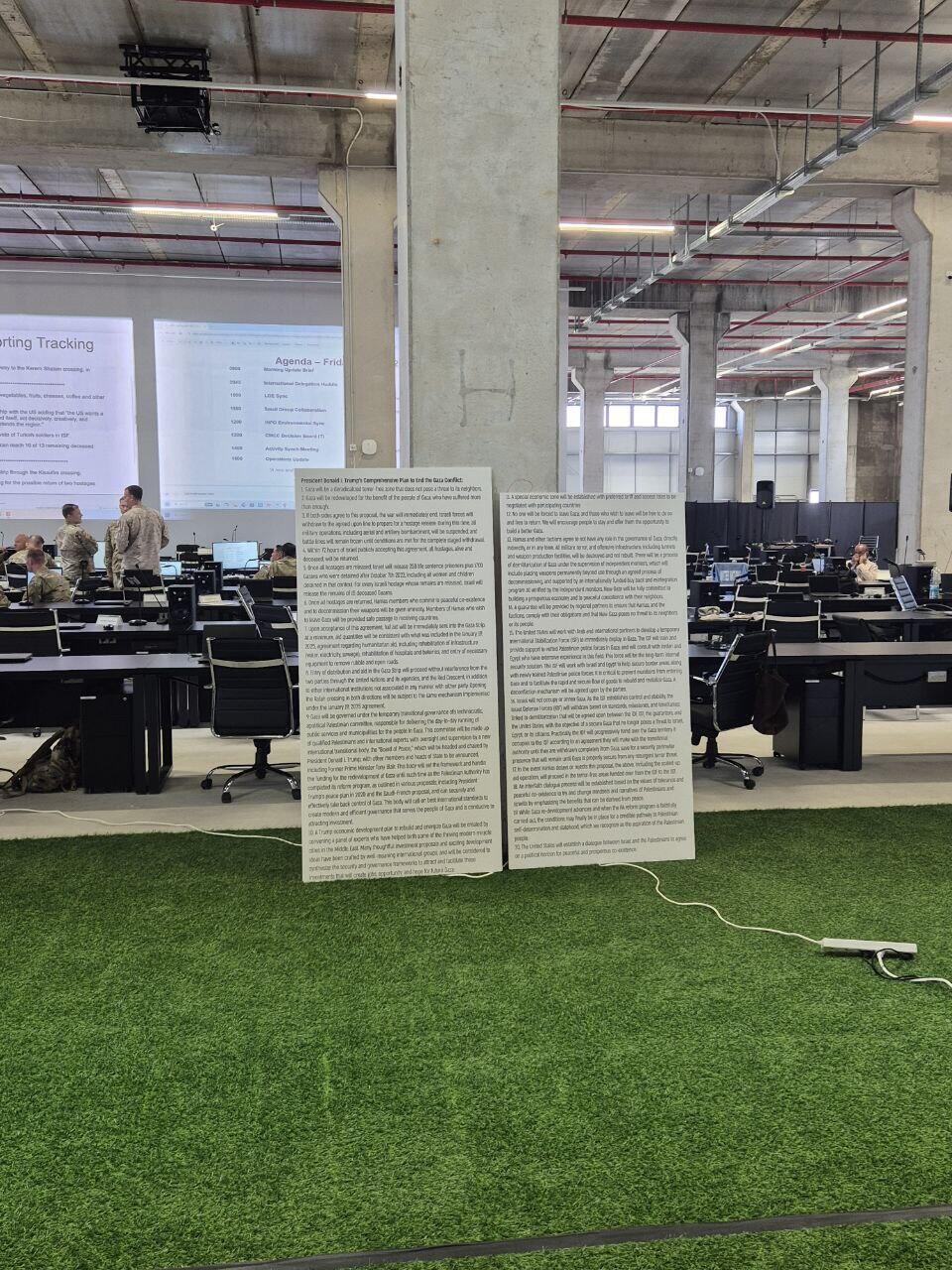 Large printed versions of Trump’s 20-point proposal hangs throughout the building (Photo: Itamar Eichner) "תוכנית 20 הנקודות" של טראמפ במפקדה האמריקנית בקריית גת