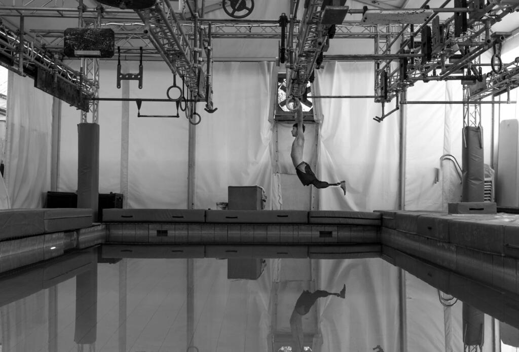 IDF soldier, a double amputee, exercises on a 'ninja' 