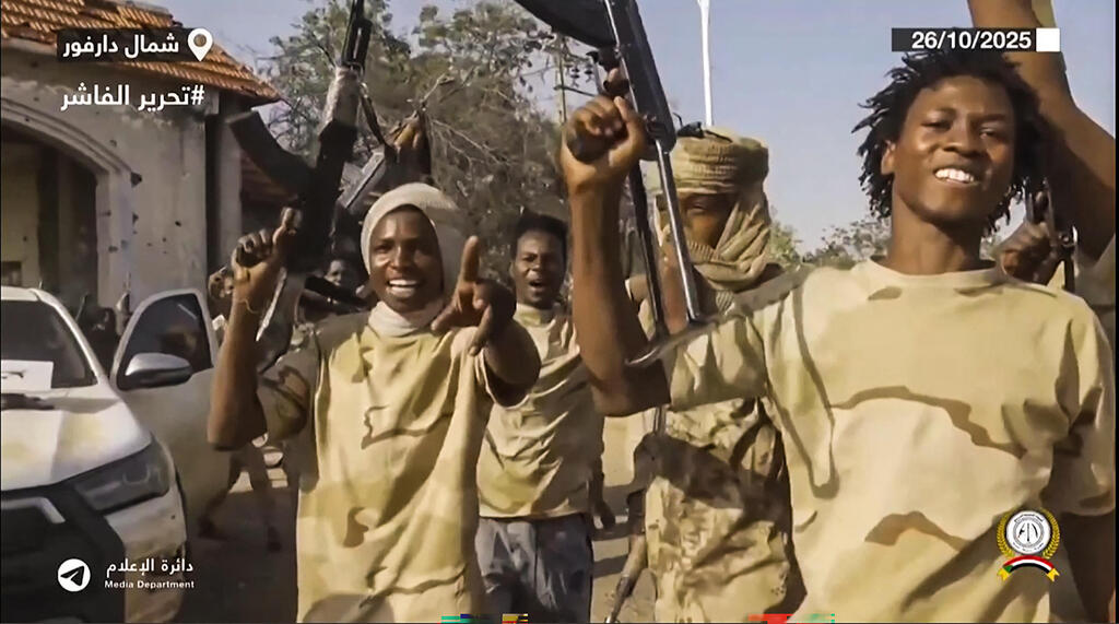 RSF fighters (Photo: AFP PHOTO / HO / SUDAN RAPID SUPPORT FORCES (RSF) TELEGRAM ACCOUNT) סודן לוחמי מיליציית ה RSF חוגגים ב רחובות של אל פאשיר אל פאשר אל-פאשיר אל-פאשר
