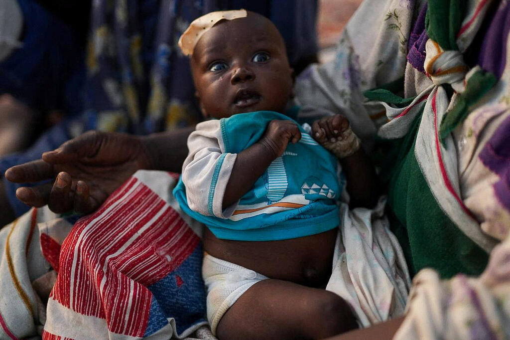 Photo: REUTERS/Mohammed Jamal פליטים שברחו מ אל-פאשר סודן לעיר טאווילה