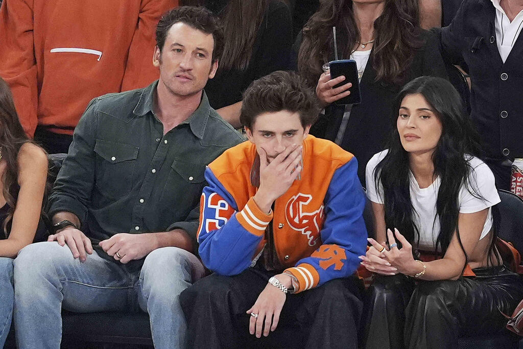 ג'נר וטימותי שאלאמה במה שניתן לתאר כ"פעילות כיפית" (צילום: AP) קיילי ג'נר וטימותי שאלאמה