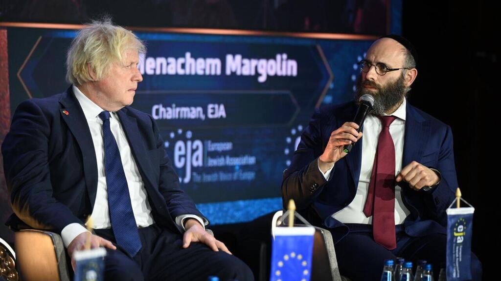 Борис Джонсон и раввин Марголлин (Фото: Йоав Дудкевич) יו"ר ה - EJA, הרב מנחם מרגולין וראש ממשלת בריטניה לשעבר, בוריס ג'ונסון