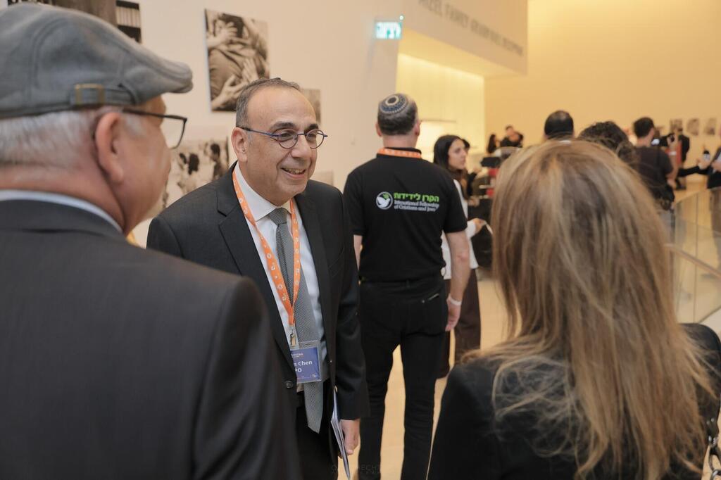 GPO Director Nitzan Chen speaks to Christian visitors at the Christian Media Summit 