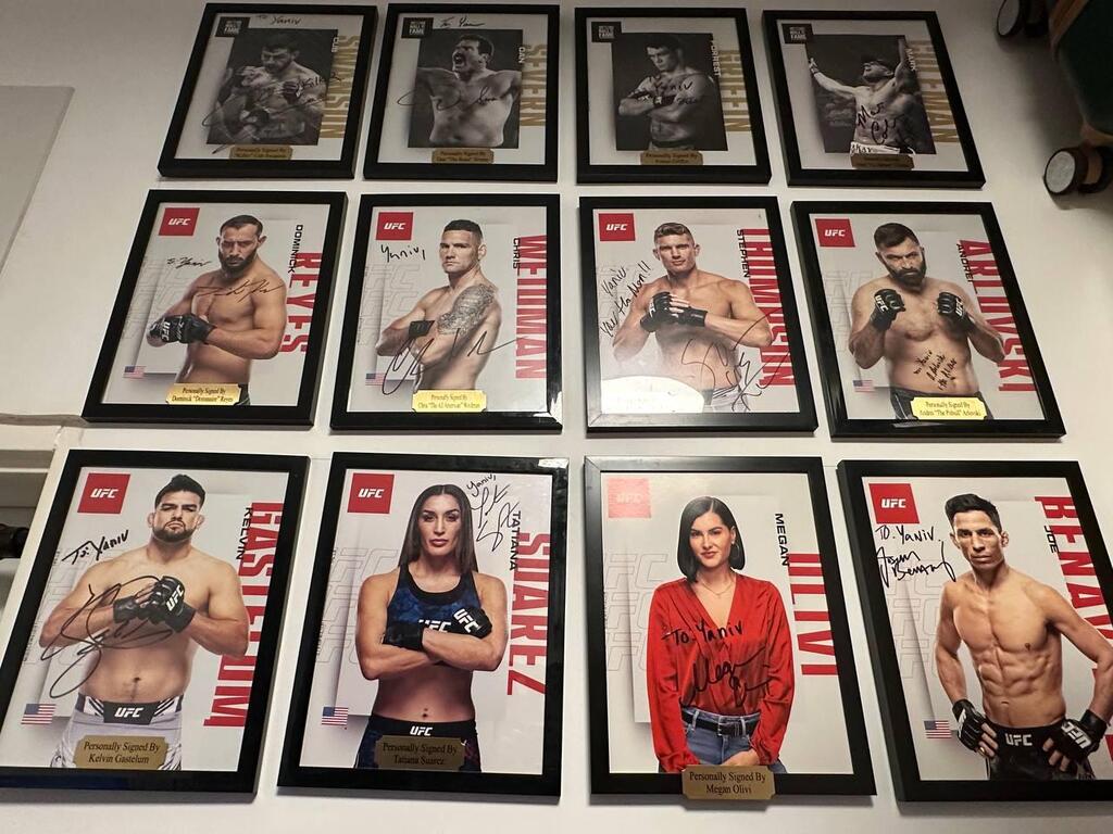 Autographed portraits of UFC fighters, including Dominick Reyes, Chris Weidman, Tatiana Suarez and Megan Olivi (Photo: Bar Gindy) Autographed portraits of UFC fighters, including Dominick Reyes, Chris Weidman, Tatiana Suarez and Megan Olivi