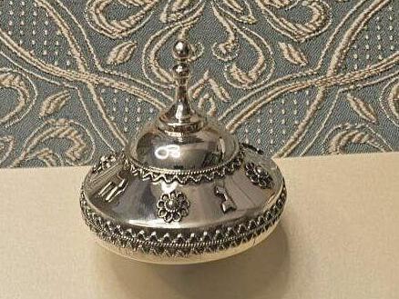 Волчок для Трампа (Фото: форум "Тиква") הסביבון שיעניק איתן מור לטראמפ