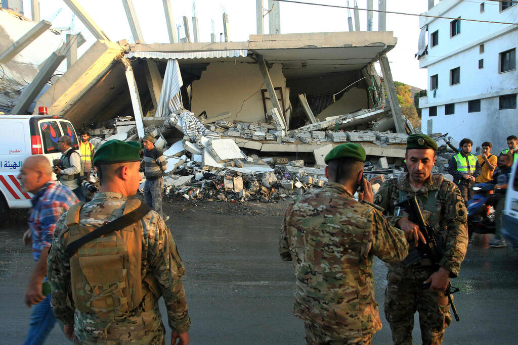 Photo: Mahmoud ZAYYAT / AFP זירת התקיפה בדיר כיפא