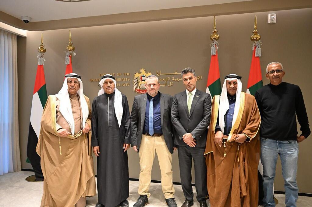 UAE Ambassador Mohamed Al Khaja (third from right) and Arad Mayor Yair Maayan (center) pose with Bedouin camel racing leaders during a meeting at the Emirati embassy in Tel Aviv, Nov. 27, 2025 