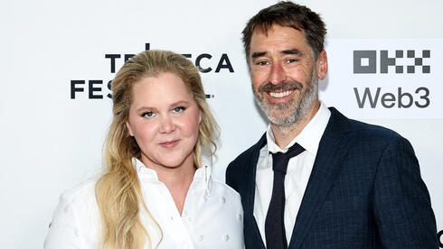 איימי שומר כריס פישר