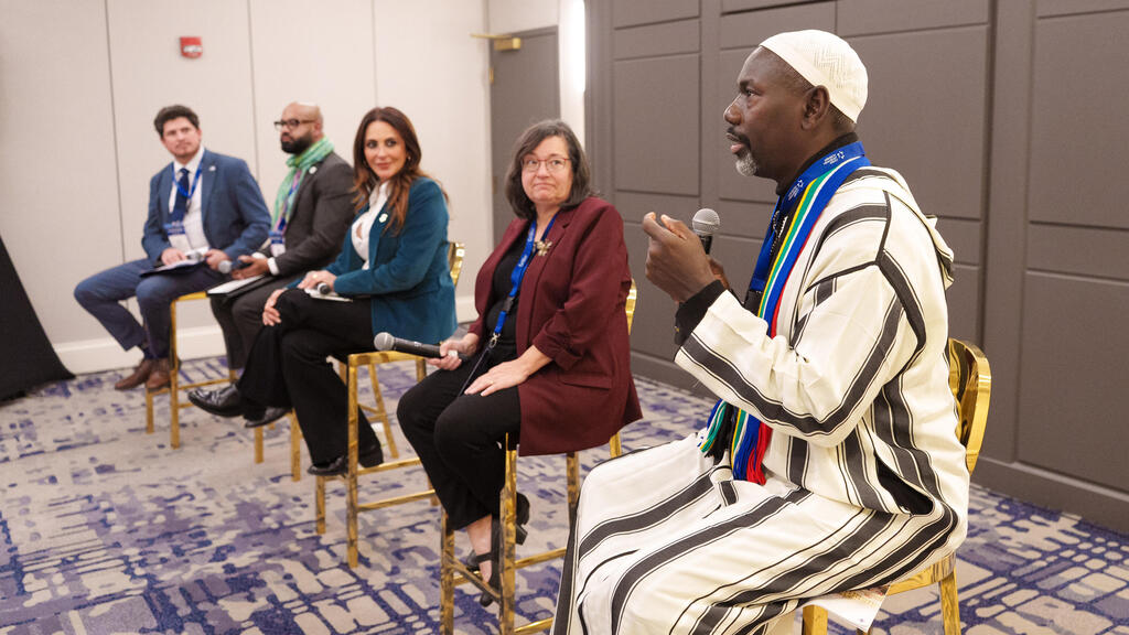 A panel at the summit (Photo: Paul Morse Photography) אחד הפאנלים בכנס
