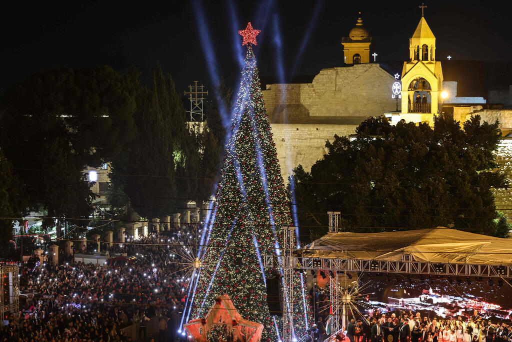 Spectators gather on Nativity Square during a Christmas tree lighting ceremony in Bethlehem, West Bank, on December 6, 2025 (Photo: HAZEM BADER / AFP) Spectators gather on Nativity Square during a Christmas tree lighting ceremony in Bethlehem, West Bank, on December 6, 2025