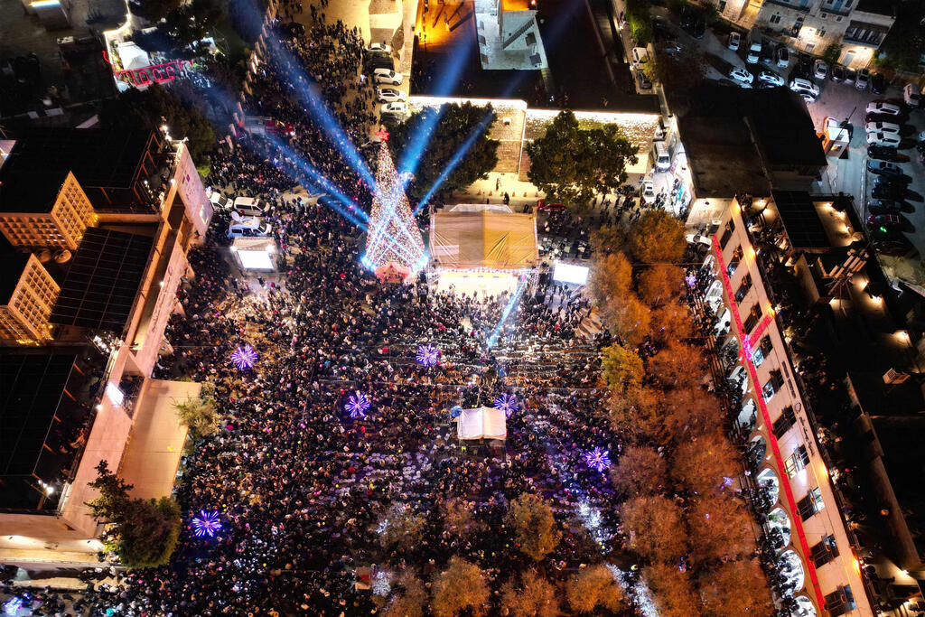 An aerial photograph shows people gathering in Nativity Square during a Christmas tree lighting ceremony in Bethlehem, West Bank, on December 6, 2025 (Photo: HAZEM BADER / AFP) An aerial photograph shows people gathering in Nativity Square during a Christmas tree lighting ceremony in Bethlehem, West Bank, on December 6, 2025