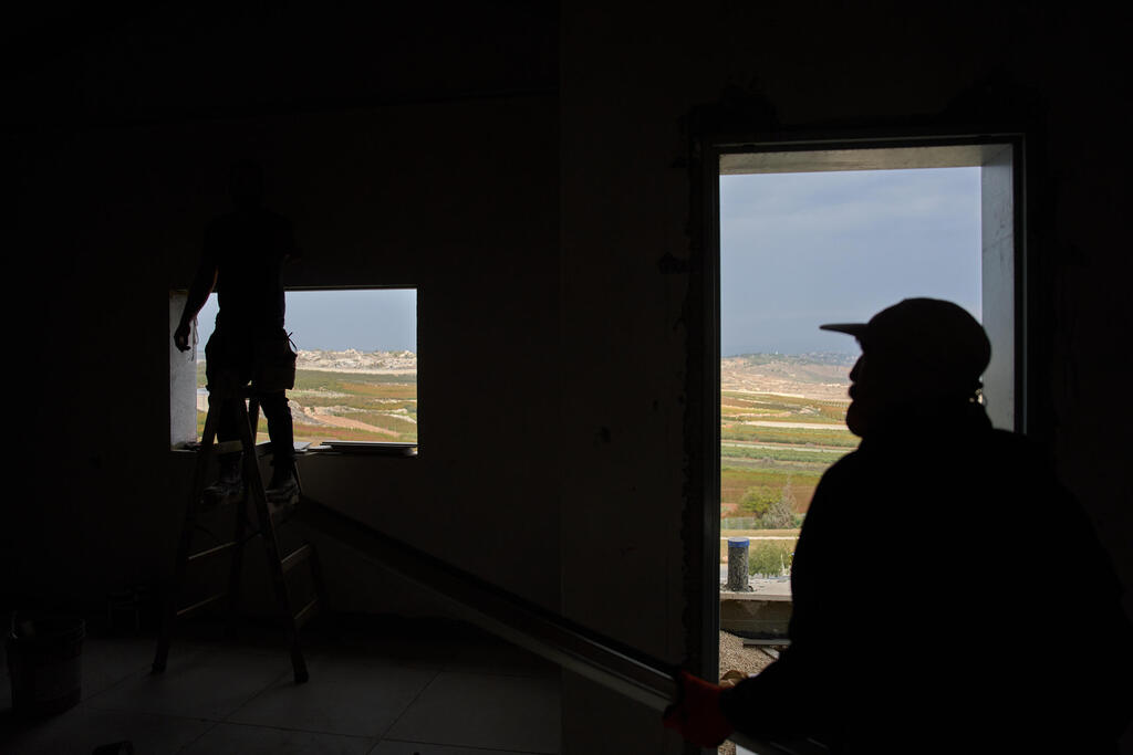 Workers fix Deputy Mayor Avi Nadiv's home in Metula, a small war-ravaged Israeli town pressed up against the Lebanon border, Sunday, Nov. 30, 2025 (Photo: AP Photo/Ariel Schalit) Workers fix Deputy Mayor Avi Nadiv's home in Metula, a small war-ravaged Israeli town pressed up against the Lebanon border, Sunday, Nov. 30, 2025