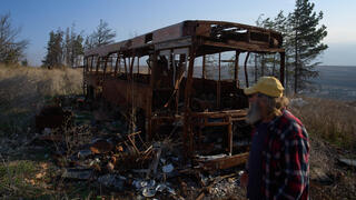 Ilan Rosenfeld walks through the burnt-out shell of his business in Metula, a small war-ravaged town pressed up against the Israel-Lebanon border, Sunday, Nov. 30, 2025 