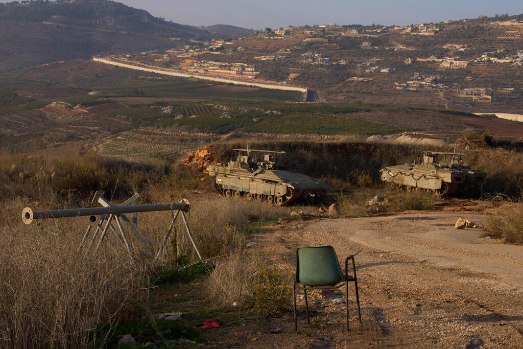 Israel's military armored personnel carriers sit in Israel's northernmost town of Metula, on the Lebanon border, Sunday, Nov. 30, 2025 (Photo: AP Photo/Ariel Schalit) Israel's military armored personnel carriers sit in Israel's northernmost town of Metula, on the Lebanon border, Sunday, Nov. 30, 2025