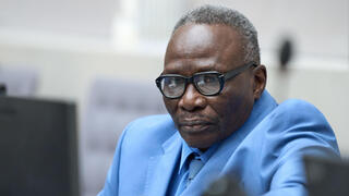 עלי מוחמד עלי עבד אל-רחמן נשפט ב האג מנהיג במיליציית ג'נג'וויד חבל דרפור סודן