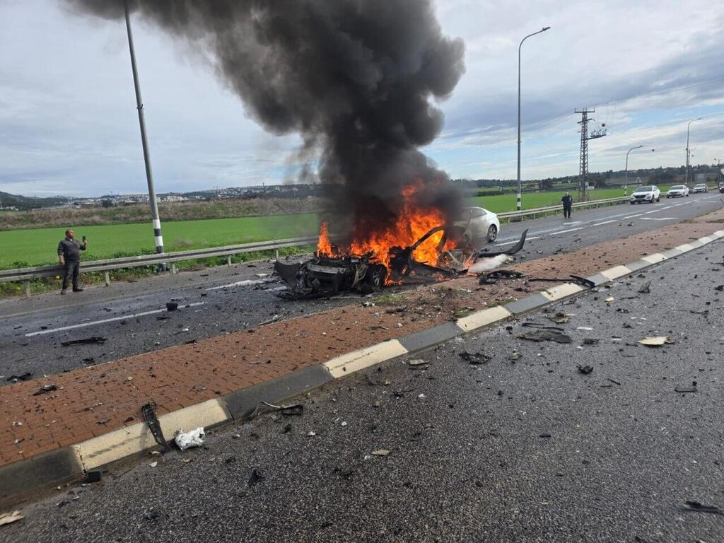 A car burns at Nahalal Junction after an explosion, killing a man and injuring two bystanders (Photo: Magen David Adom) רכב נשרף בצומת נהלל