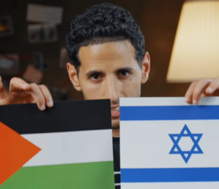 נאס דיילי באחד מסרטוניו. אחרי 7 באוקטובר הצהיר כי הוא קודם כל ישראלי