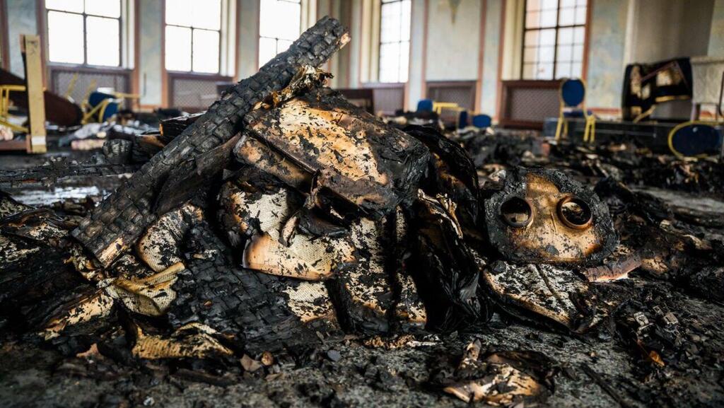 Remains of holy books damaged in arson attack (Photo: Yehoshua Fruchter and Meir Zelznik) שרידי ספרי הקודש