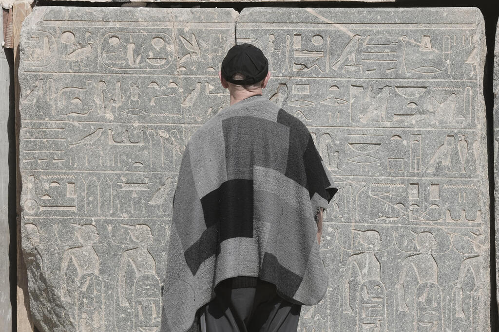 A visitor looks at the base of the reassembled alabaster statue for Pharoah Amenhotep III, in the southern city of Luxor, Egypt, Sunday, Dec. 14, 2025 (Photo: AP Photo/Amr Nabil) A visitor looks at the base of the reassembled alabaster statue for Pharoah Amenhotep III, in the southern city of Luxor, Egypt, Sunday, Dec. 14, 2025