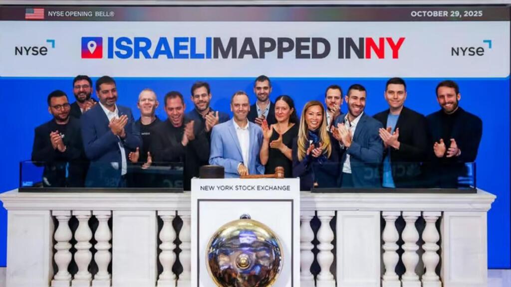 Guy Franklin ringing the Wall Street bell Guy Franklin ringing the bell