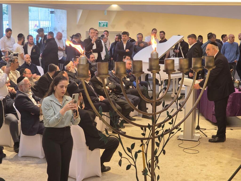 A menorah crafted from the remains of an Iranian missile stands at the heart of ALEH’s renovated campus in Bnei Brak, Dec. 15, 2025 