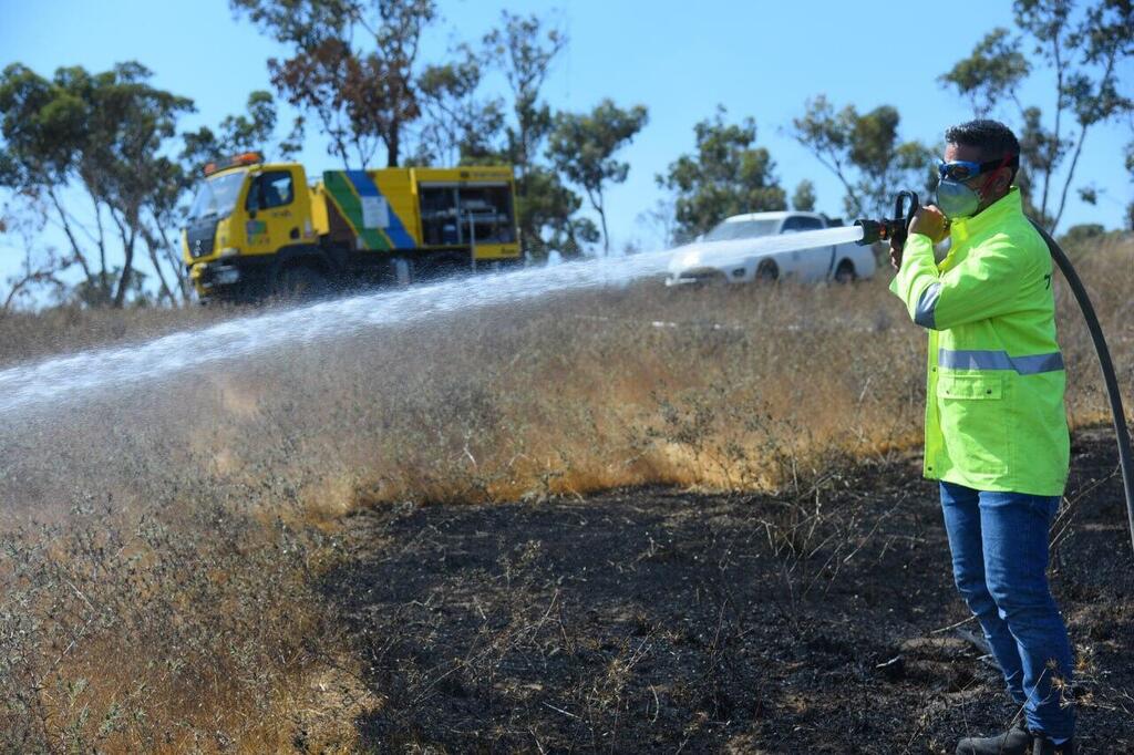 KKL firefighting crews battle a wildfire in southern Israel 
