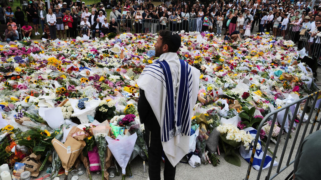 אוסטרליה פיגוע טרור טבח חנוכה סידני פרחים ב זירת הפיגוע