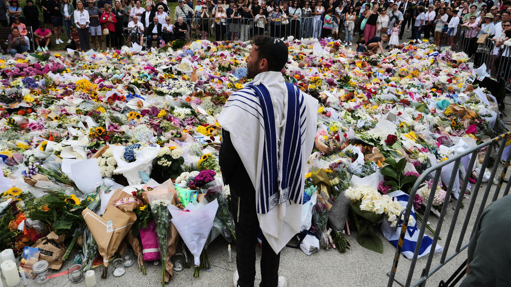 אוסטרליה פיגוע טרור טבח חנוכה סידני פרחים ב זירת הפיגוע