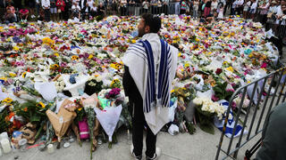 אוסטרליה פיגוע טרור טבח חנוכה סידני פרחים ב זירת הפיגוע