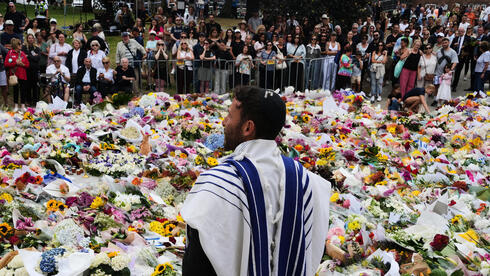 אוסטרליה פיגוע טרור טבח חנוכה סידני פרחים ב זירת הפיגוע