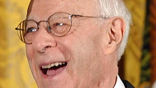 Norman Podhoretz receives the Presidential Medal of Freedom, the nation's highest civil award, from President Bush during a ceremony in the East Room of the White House, June 23, 2004