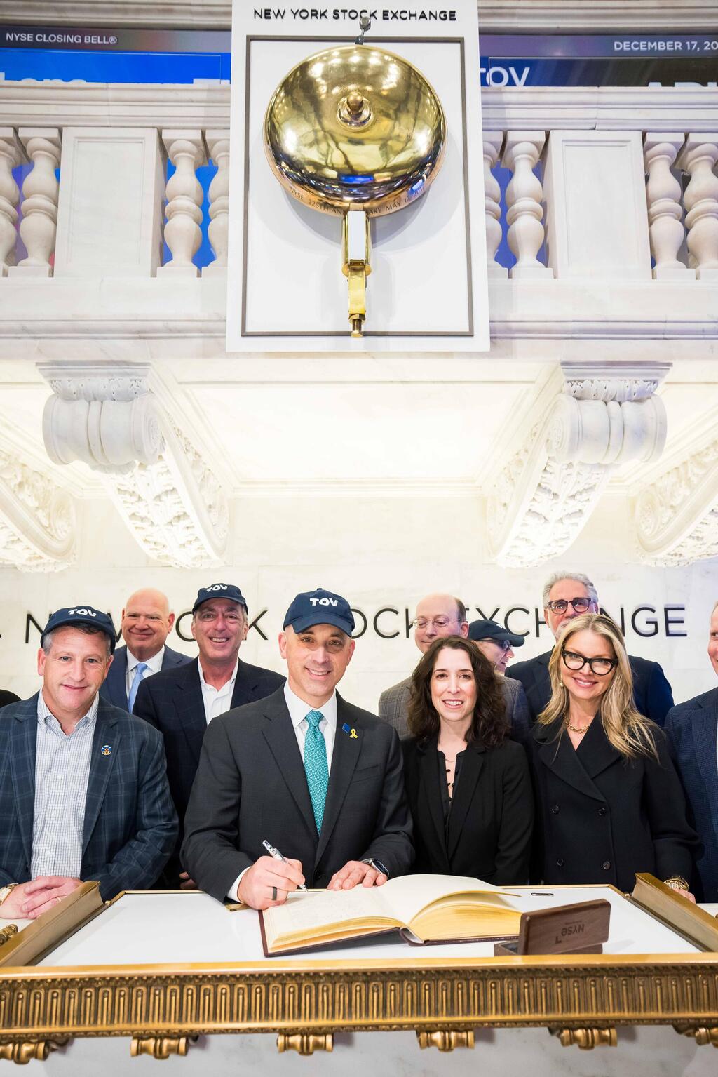 Jonathan Greenblatt, CEO of the Anti-Defamation League, signs the ceremonial book at the New York Stock Exchange after ringing the closing bell, Wednesday, Dec. 17, 2025, in New York (Photo: NYSE) Ari Hoffnung, managing director of JLens, signs the ceremonial book at the New York Stock Exchange after ringing the closing bell, Wednesday, Dec. 17, 2025, in New York
