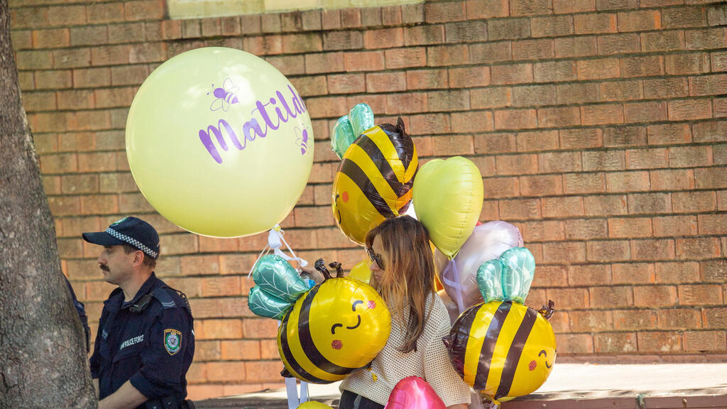Воздушные шары на похоронах Матильды (Фото: REUTERS/Jeremy Piper) הלוויה של הילדה מתילדה ב סידני אוסטרליה שנרצחה טבח פיגוע